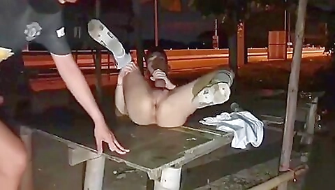 Sexy girl's sexy feet in a park