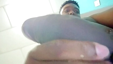 Two asian gives a black dick sucking dildo